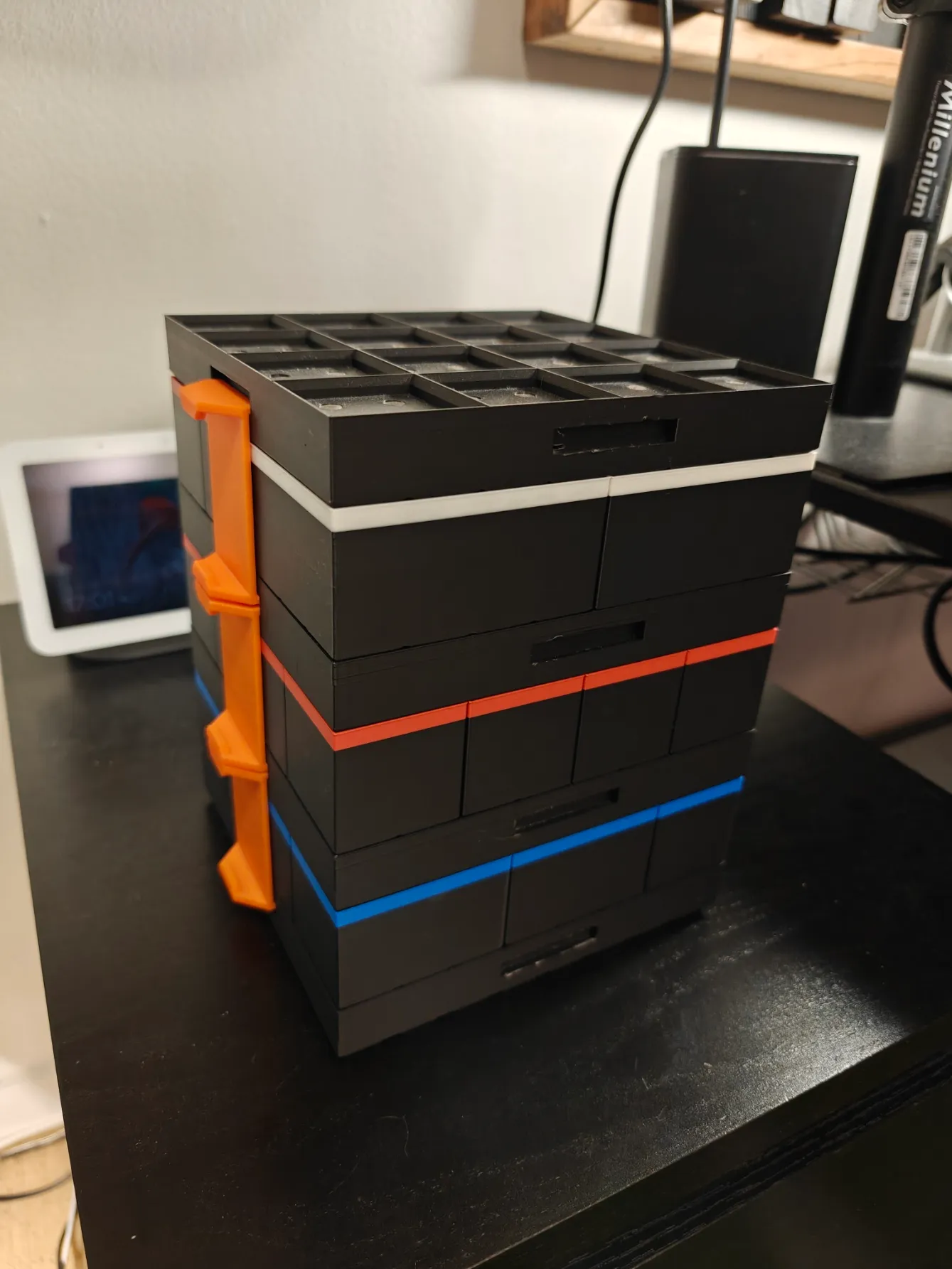 Stacked magnetic organizer frames filled with bins